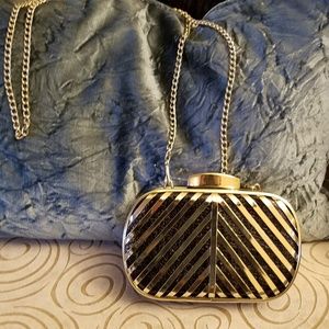 Glam Rock Metal and Faux Lizard Skin Clutch